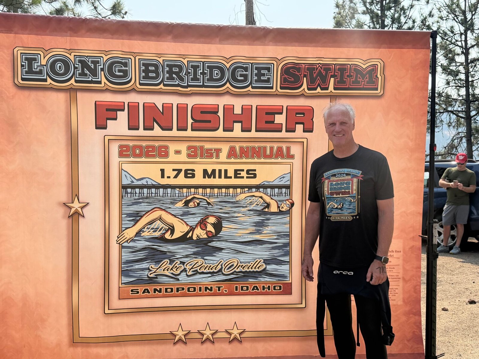 John at the Long Bridge Swim finisher display